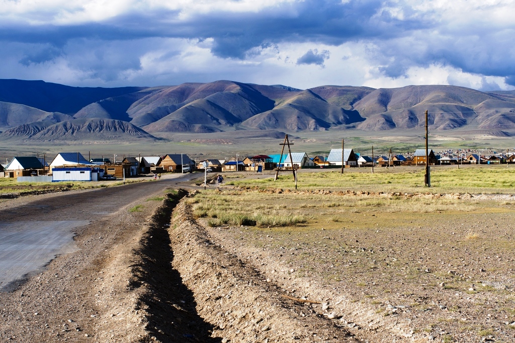 Dusty remote border town near Tashanta, Altai Republic — evoking the forgotten frontiers that inspired American Pipe Dream Supply™